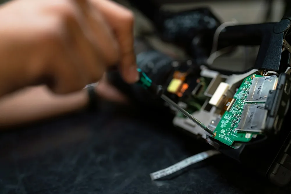 Plano technician repairing modern high-end appliance
